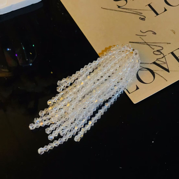 Kristalne resice naušnice – ručno pletene, vodopadni uzorak, nišni stil