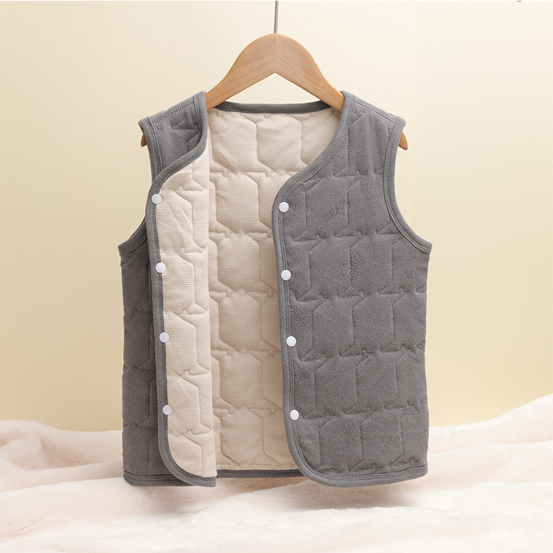 Bērnu termālā veste - bieza ziemas flīss, iekšējā poliesteru odere, bez piedurknēm ar slēgtu pogu aizvēršanu, universāla