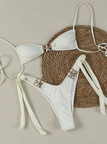 Двучастков бански костюм, солиден модел, без ръкави, открит гръб, с подплътени чаши, без метална опора; плат: найлон 82%, подплата 18%; тегло 150 г; за възрастни жени, плуване и газене; код на продукта Ff1179