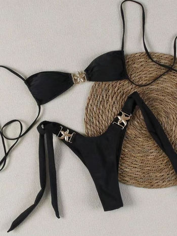 Двучастков бански костюм, солиден модел, без ръкави, открит гръб, с подплътени чаши, без метална опора; плат: найлон 82%, подплата 18%; тегло 150 г; за възрастни жени, плуване и газене; код на продукта Ff1179