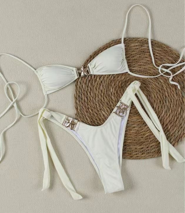 Двучастков бански костюм, солиден модел, без ръкави, открит гръб, с подплътени чаши, без метална опора; плат: найлон 82%, подплата 18%; тегло 150 г; за възрастни жени, плуване и газене; код на продукта Ff1179