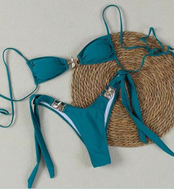 Двучастков бански костюм, солиден модел, без ръкави, открит гръб, с подплътени чаши, без метална опора; плат: найлон 82%, подплата 18%; тегло 150 г; за възрастни жени, плуване и газене; код на продукта Ff1179