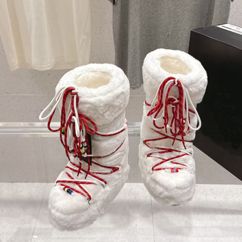 Дамски снежни ботуши с дебела подметка и вътрешно повдигане – средно високи, кръгъл нос, плосък ток; Горна част: тъкан овча вълна и кадифе; Вътрешна част: овча вълна и кадифе; Подметка: пяна гума