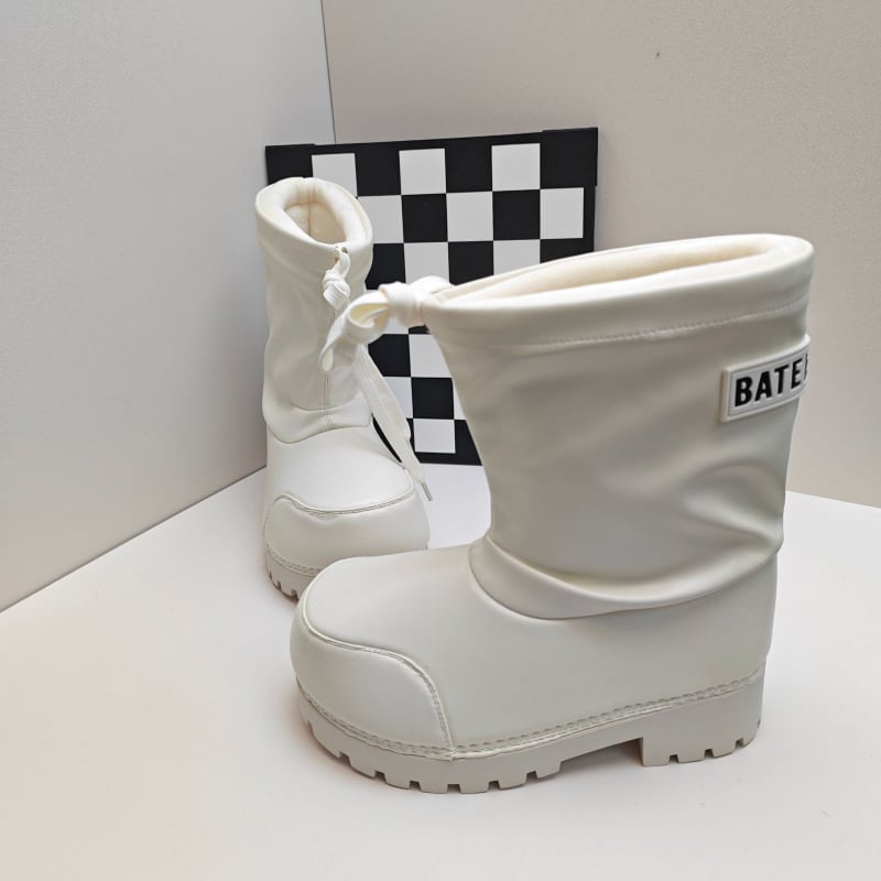 Sieviešu ziemas ūdensnecaurlaidīgas zābaki ar biezu zoli un plašu purnu, augsts augšdaļas, silta oderējuma, gumijas zole