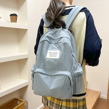 Női iskolai hátizsák, városi minimalist stílus, nylon anyag, kapacitás 20–35L, görbült vállpántok, poliészter bélés