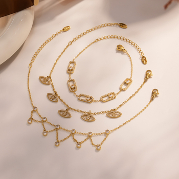 Женска гривна с множество висулки, мотив злоокото око, неръждаема стомана, позлата 18K, кристални акценти