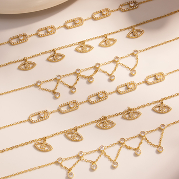 Женска гривна с множество висулки, мотив злоокото око, неръждаема стомана, позлата 18K, кристални акценти