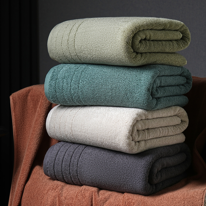 Felnőtt pamut fürdőlepedő jacquard szövésű, 500 g+-os tömeg, 32s fonal, hímzett logó