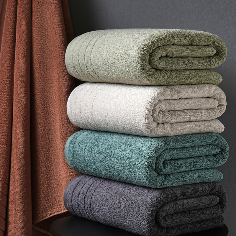 Felnőtt pamut fürdőlepedő jacquard szövésű, 500 g+-os tömeg, 32s fonal, hímzett logó