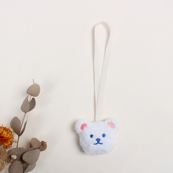 Kirjutatava nimega beebide luttihoidik plüüsmõmmiga, närimismis ja kruusi ripats – nime saab sisestada • polüester • eraldi pakend • beebidele vanuses 0–3 aastat