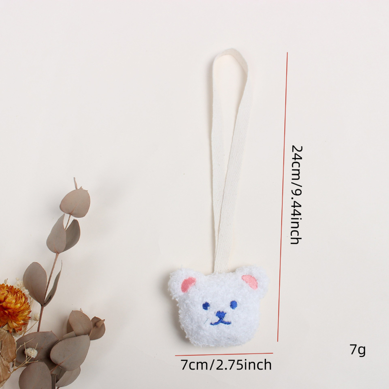 Kirjutatava nimega beebide luttihoidik plüüsmõmmiga, närimismis ja kruusi ripats – nime saab sisestada • polüester • eraldi pakend • beebidele vanuses 0–3 aastat