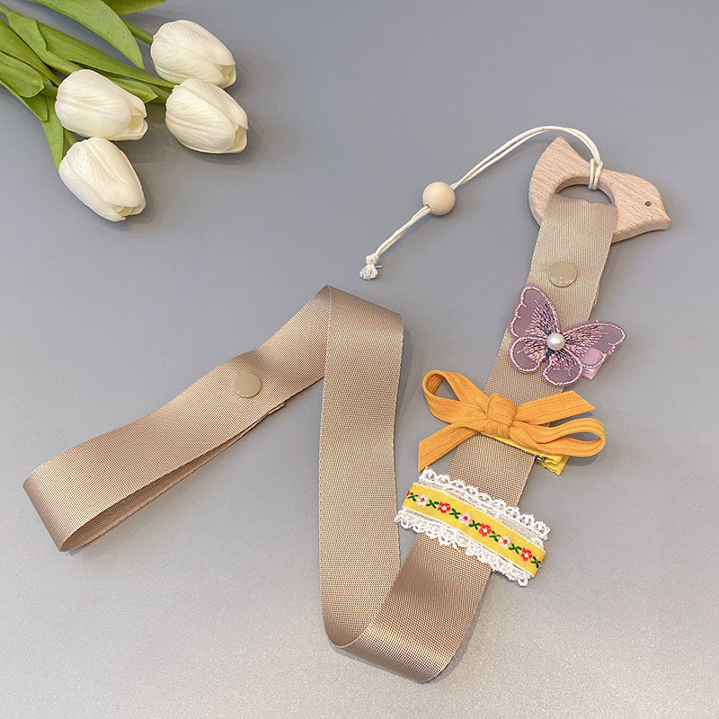 Korea-stiilis laste juukseklipsi hoidik seinarihmaga, käsitöö, Cortex-materjal, mudel A2011