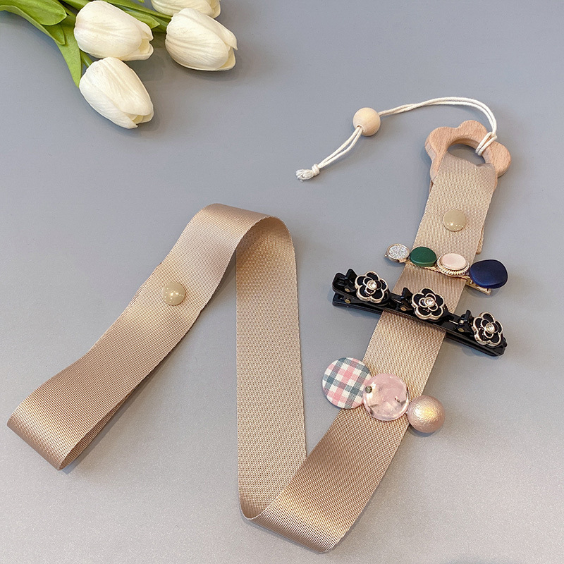 Korea-stiilis laste juukseklipsi hoidik seinarihmaga, käsitöö, Cortex-materjal, mudel A2011