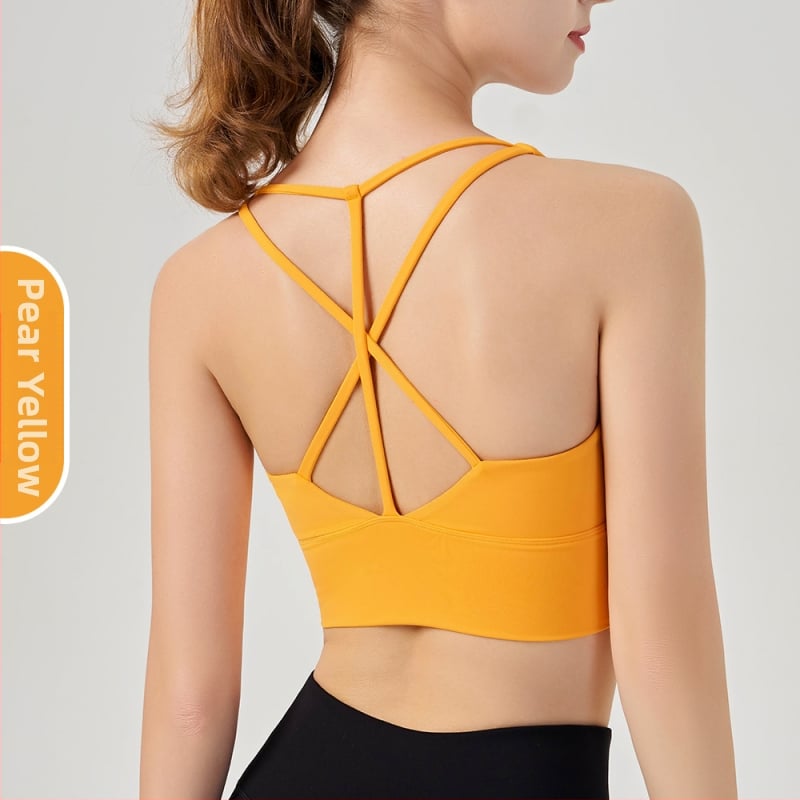 Moterų jogos ir pilates sportinė liemenėlė su krūties pagalvėlėmis, drėgmę šalinantis audinys, nailonas 75%/spandeksas 25%, siauras kirpimas, liemens ilgis, rudens leidimas 2025