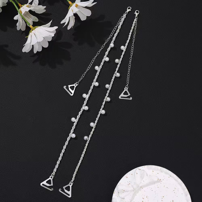 Plecu siksna apģērbam ar neizskatāmiem kristāliem un metāla pērlēm • Materiāls: titāna tērauds • Stils kods: 22105853830 • Izlaidums: 2024. gada vasara • Virsma: gluda, draudzīga ādai