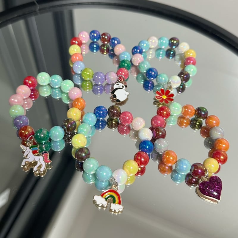 Vaikų apyrankė su vienaragio pakabuku — rankų darbo akriliniai karoliukai, animacinių personažų dizainas, logotipo spausdinimas įmanomas, amžiaus grupė 3-10 metų