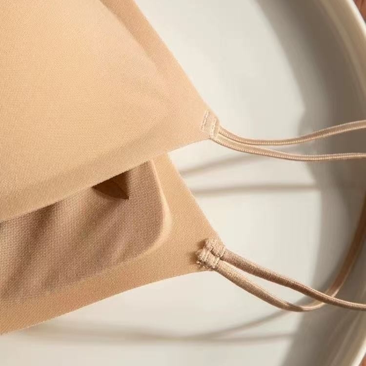 Bešavni grudnjak s podrškom za podizanje, 3/4 košarice s tankim oblikovanim košaricama, fiksni dvostruki naramenici, stražnje kopčanje u jednom redu, vanjski najlon, podstava od spandeksa (<30%)