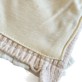 Laste talvemüts kaheskiire kõrvakaitsega, lille- ja tähtmotiiv, tuulekindel, tie-dye efektiga kudum, vanus 6–12 kuud ja 1–2 aastat; võlur-mütsi stiil