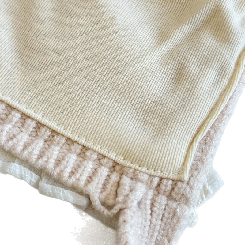 Laste talvemüts kaheskiire kõrvakaitsega, lille- ja tähtmotiiv, tuulekindel, tie-dye efektiga kudum, vanus 6–12 kuud ja 1–2 aastat; võlur-mütsi stiil