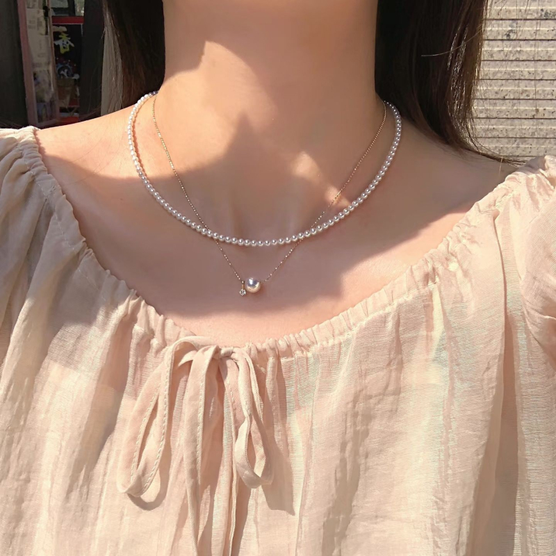 Κολιέ με φυσικά μαργαριτάρια γλυκού ύδατος, τέλεια στρογγυλά, πλεγμένο με 18K χρυσό, μήκος 41–50 εκ