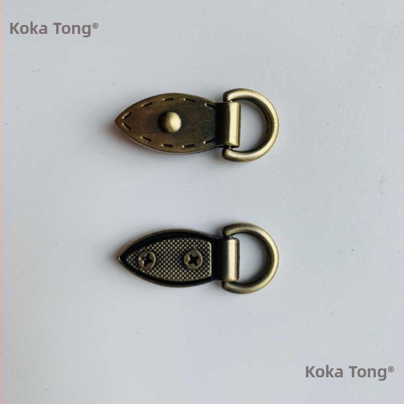 sanmushi taška s kovovými prvkami, popruh cez rameno, ušné háčiky, bajonetové spony, bočné klipy