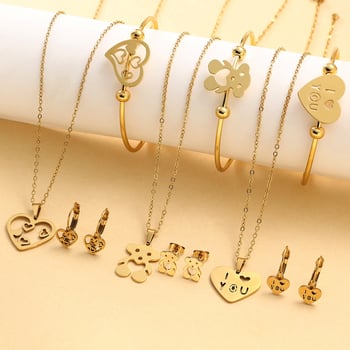 Rozsdamentes acélból készült ékszerszett: fülbevalók, nyaklánc és kézre kiegészítők; elektroplatázásos felületkezelés; kulcscsonti lánc; medálok szív, csepp és harang formában; friss és édes stílus