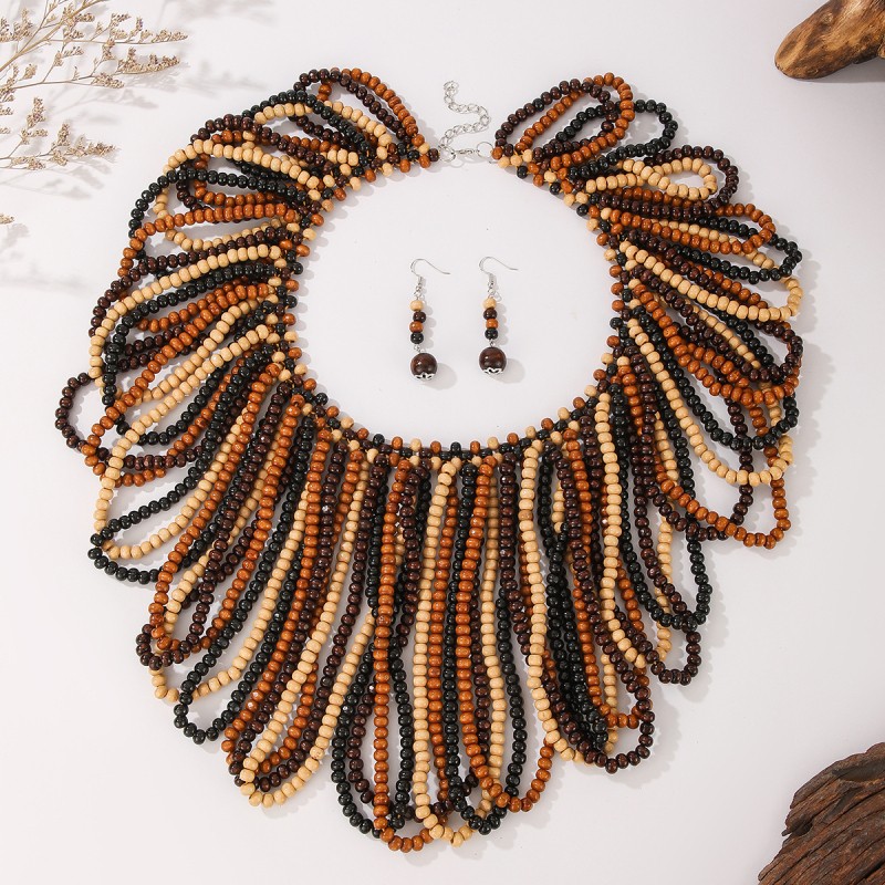 Fa gyöngyös tassel nyaklánc és fülbevaló készlet; többszintű, virágos mintázat; anyag: fa; feldolgozás: sütött festék; lánc stílus: golyó lánc; készlet: fülbevaló + nyaklánc