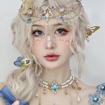 Etnopeakaunistus bojtidega ja veetilja kujulise otsmiku dekoratsiooniga, juukseklips, elektroplaaditud sulam