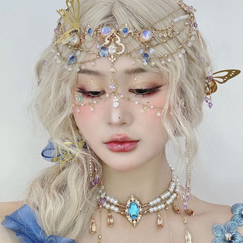 Etnopeakaunistus bojtidega ja veetilja kujulise otsmiku dekoratsiooniga, juukseklips, elektroplaaditud sulam