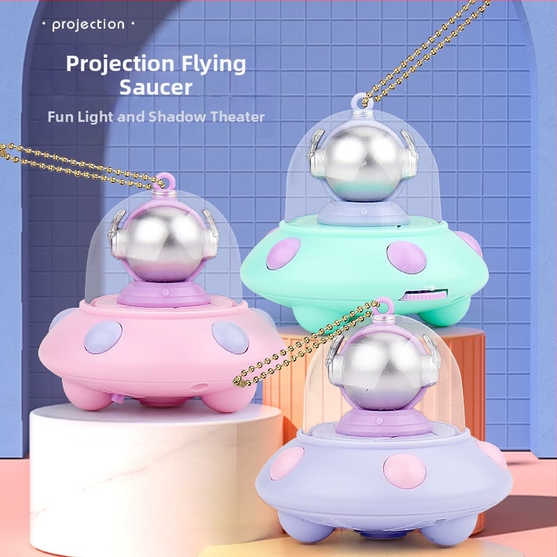 Ключодържател с прожектор: мини светещ аксесоар с дизайн летяща чиния и астронавт (LED проектор, пластмасов, за деца 4–6 години)