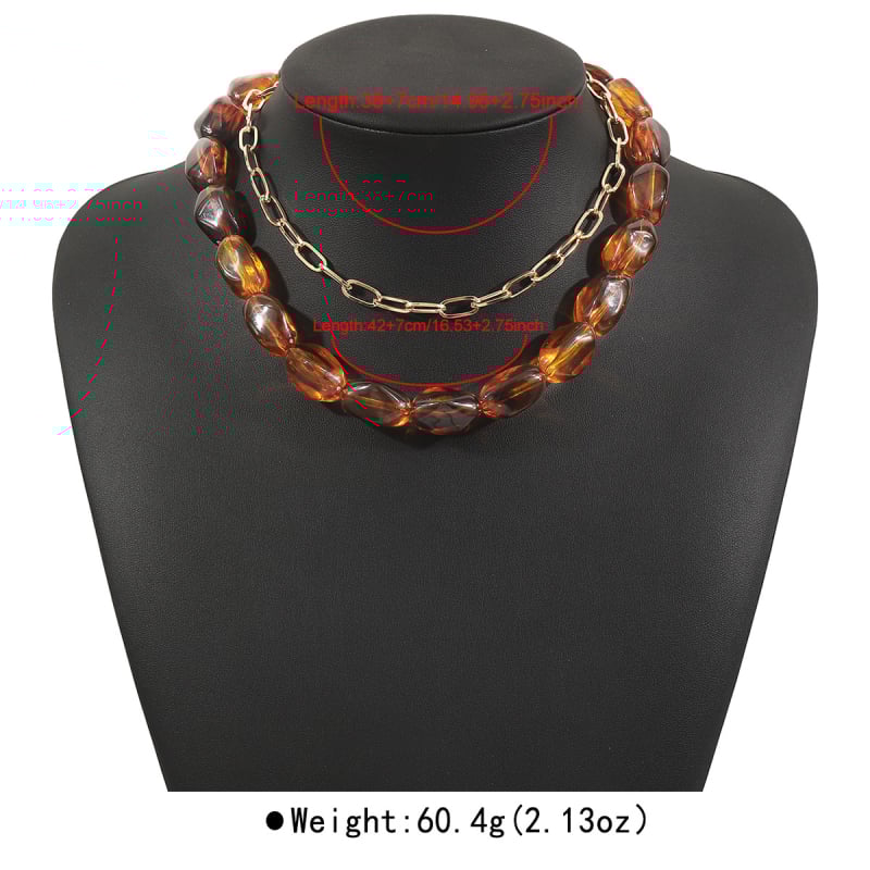 Geometriai nyaklánc gyanta gyöngyökkel, többszörös kulcscsonti lánccal; anyag: ötvözet + gyanta; medál: gyanta; Maidi