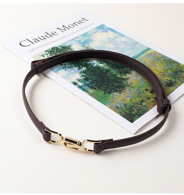 Övvel ellátott ruha műbőrből, övcsat ötvözetből, gombos zárás, elektroplakolás, márka An yulan