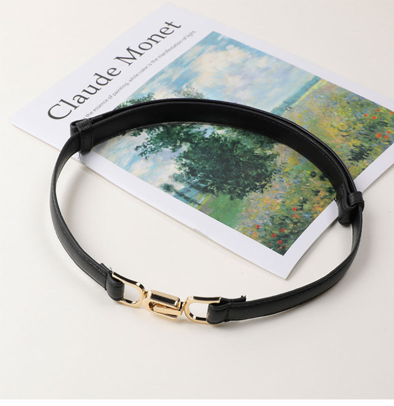 Övvel ellátott ruha műbőrből, övcsat ötvözetből, gombos zárás, elektroplakolás, márka An yulan