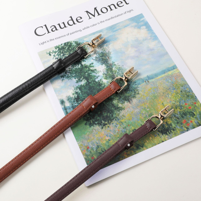 Övvel ellátott ruha műbőrből, övcsat ötvözetből, gombos zárás, elektroplakolás, márka An yulan