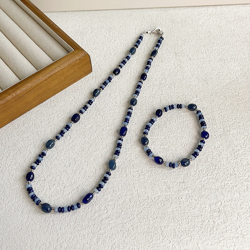 Ženska ogrlica s klavikijalnim lancem, ručno izrađena, geometrijskog oblika, od lapis lazuli