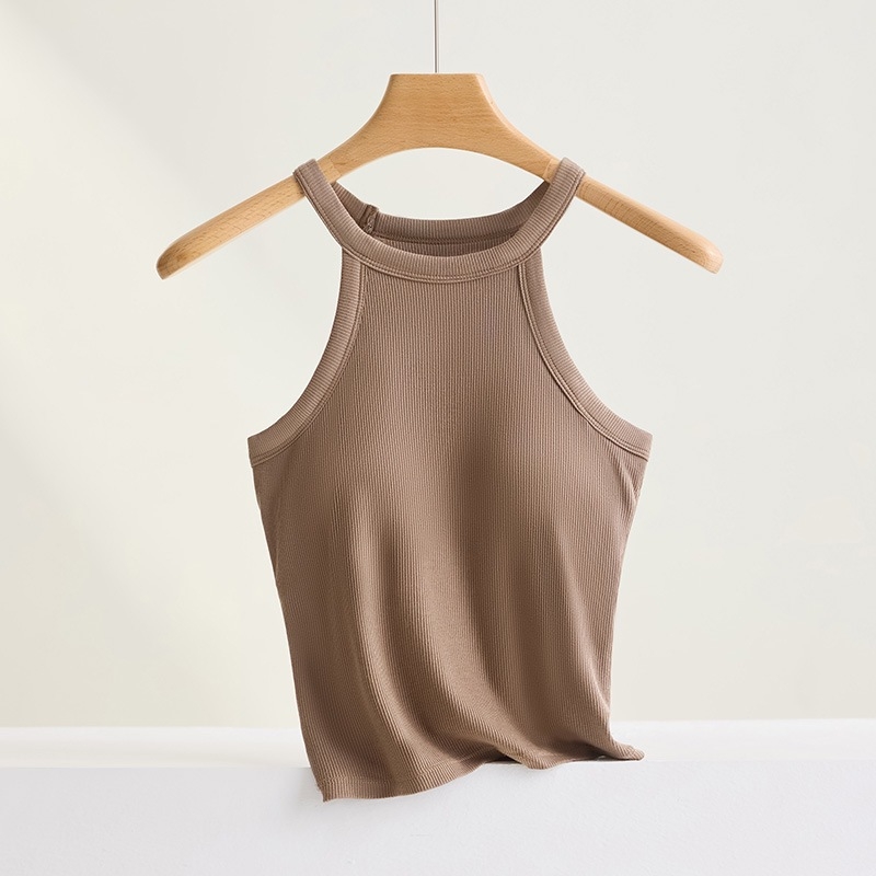 Halter top s ugrađenim pamukastim jastučićima; materijal: viskoza (95–100% viskoze); debljina tkanine: umjerena (181–200 g/m²); izrez: kružni; stil: halter, svestran