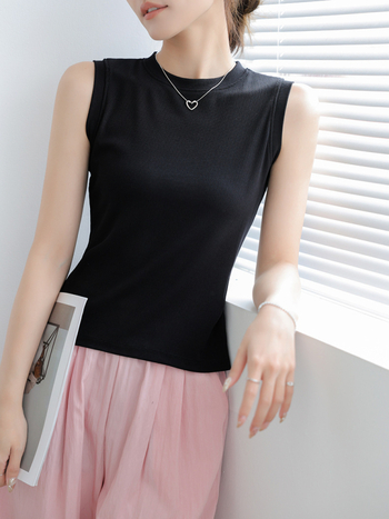 Pamučna kamizola, uska silueta, prugasti ili karirani uzorak, duljina 50–65 cm, ljeto 2025