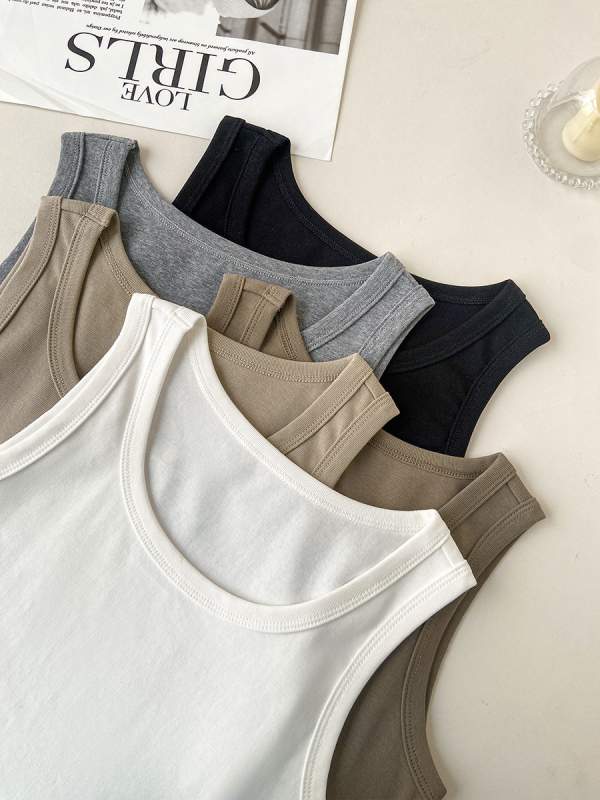 Ženski bezrukavni top, uski kroj, pamuk-elastan mješavina, visoka elastičnost, duljina 50–65 cm, proljeće 2025