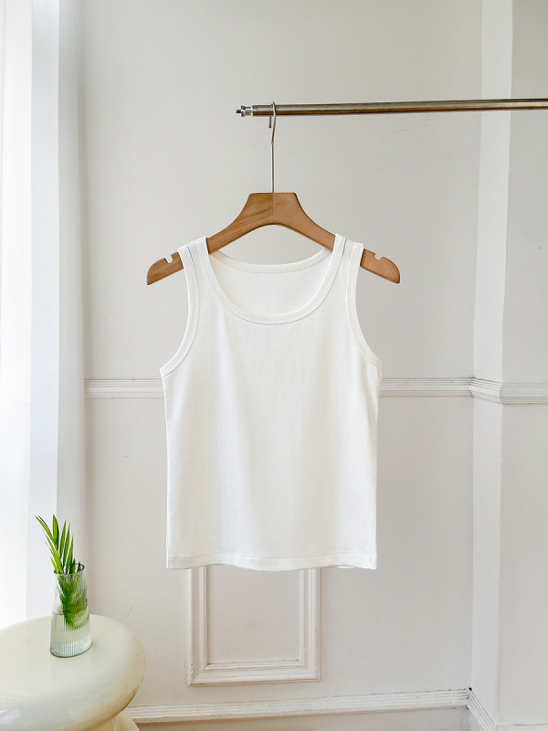 Ženski bezrukavni top, uski kroj, pamuk-elastan mješavina, visoka elastičnost, duljina 50–65 cm, proljeće 2025