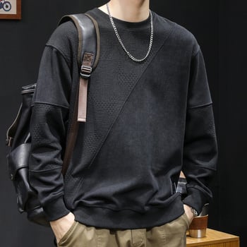 Férfi fleece pulóver patchwork dizájnnal, kerek nyakú, laza szabású, poliészter 93,5% + elasztán 6,5%, tavasz–őszre.