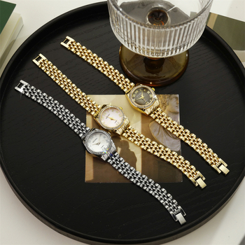 Дамски кварцов часовник с каишка от неръждаема стомана, кръгъл циферблат, корпус от сплав, кристални акценти