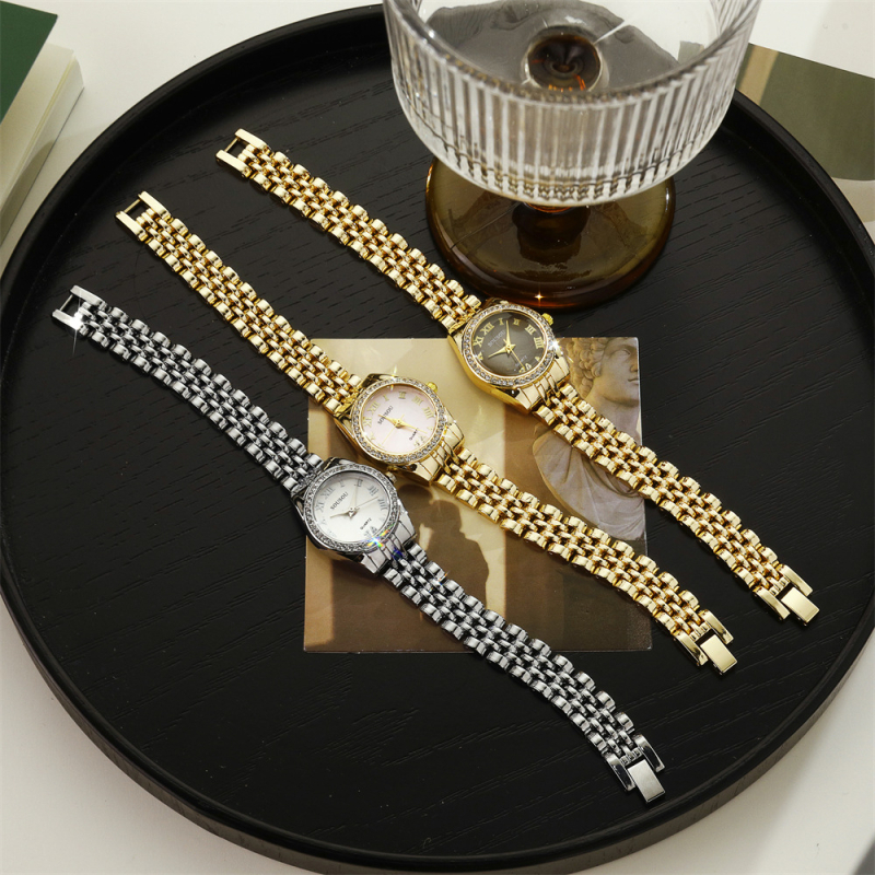 Дамски кварцов часовник с каишка от неръждаема стомана, кръгъл циферблат, корпус от сплав, кристални акценти