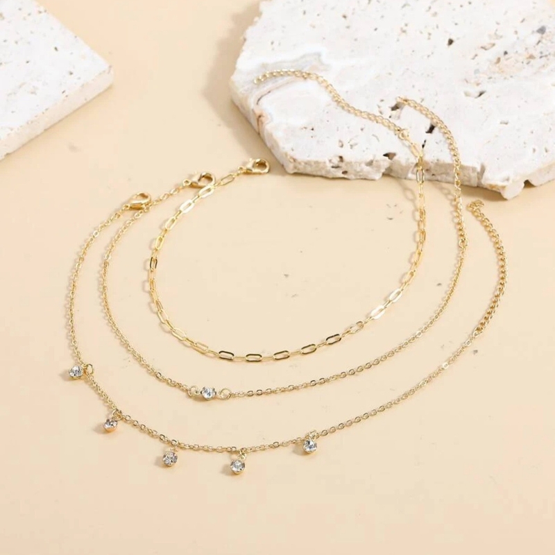 Eiropas un Amerikas pārrobežu rotaslietas, daudzslāņu, daudzpusīga potītes aproce, jauna, moderna pludmales brīvdienu stila potītes aproce.