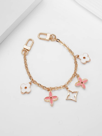 Plecu siksna ar pagarināšanas ķēdi LV Three-in-One Mahjong somai, metāla materiāls, četrziedu dekoratīvā ķēde, zīmols Famous Ancient Hui, pavasaris 2023