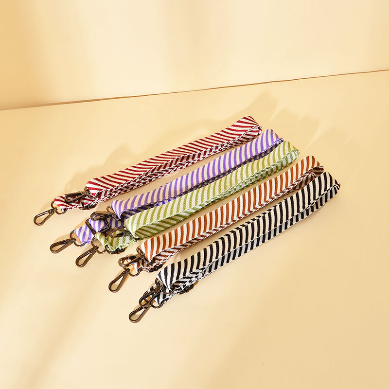 Somas pleca siksna, regulējama, adīta, krāsainas svītras, poliesteris