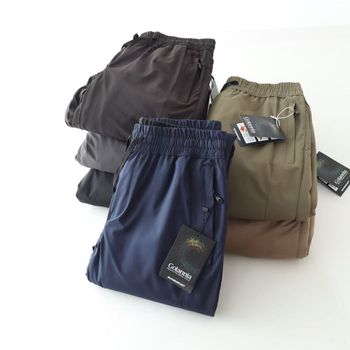 Férfi egyenes szabású sportnadrág, magas derékkal, övvel, kémiai rostok keverékéből, nagy rugalmasság