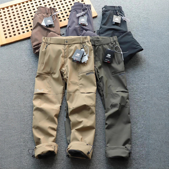 Muške hlače s fleece podstavom, vjetro i vodonepropusne, ravnog kroja, srednji pojas, poliester, mikroelastičnost, s podesivim manžetama na nogavicama