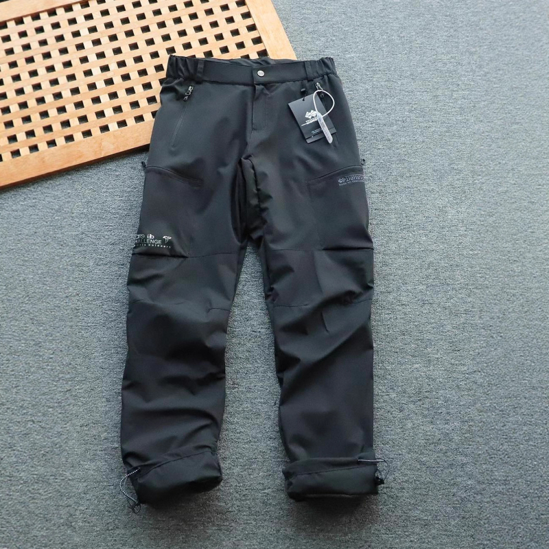 Muške hlače s fleece podstavom, vjetro i vodonepropusne, ravnog kroja, srednji pojas, poliester, mikroelastičnost, s podesivim manžetama na nogavicama