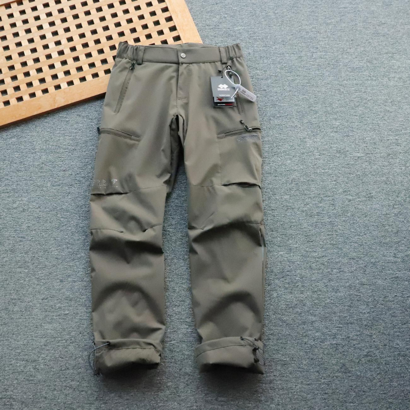 Muške hlače s fleece podstavom, vjetro i vodonepropusne, ravnog kroja, srednji pojas, poliester, mikroelastičnost, s podesivim manžetama na nogavicama