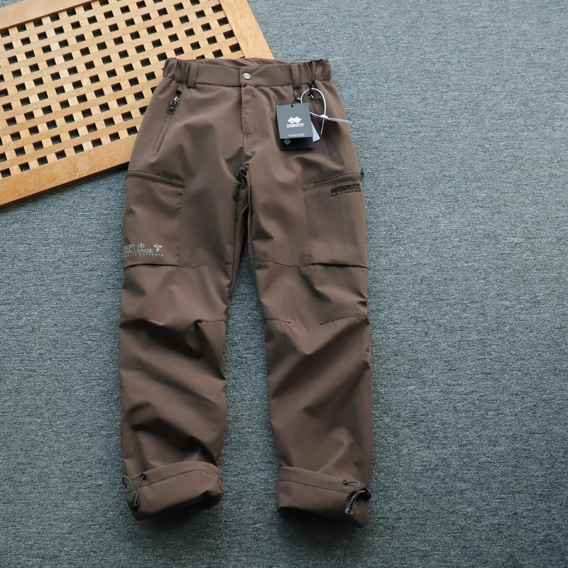 Muške hlače s fleece podstavom, vjetro i vodonepropusne, ravnog kroja, srednji pojas, poliester, mikroelastičnost, s podesivim manžetama na nogavicama